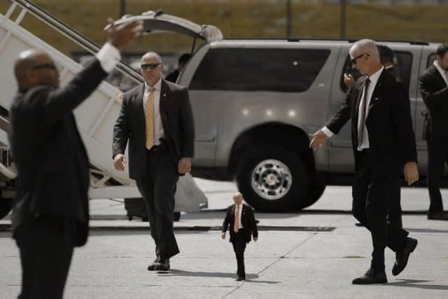 Admit It:  A Two Foot Tall Donald Trump Next to Secret Service is Funny