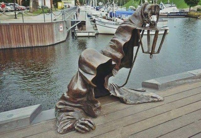 Creepy “Black Ghost” Sculpture in Klaipeda, Lithuania Might be My Favorite Ever