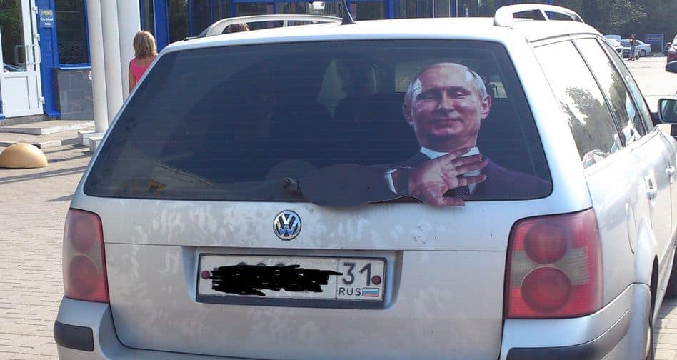 Vladimir Putin Car Decal with Forearm Zip tied to Windshield Wiper Blade