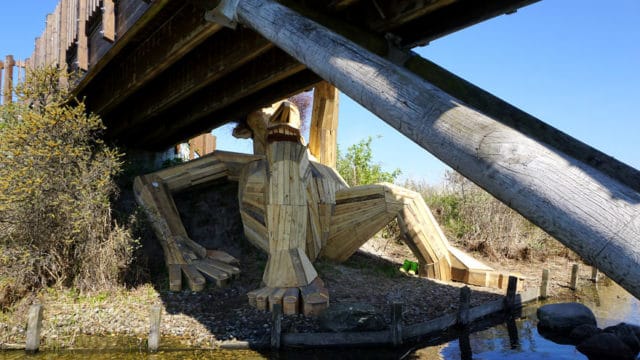 Danish Artist Hide Giants That He Makes From Wood In The Wilderness