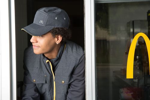 New McDonald&#8217;s Uniforms Channel a Dark, Dystopian Hunger Games-Like World