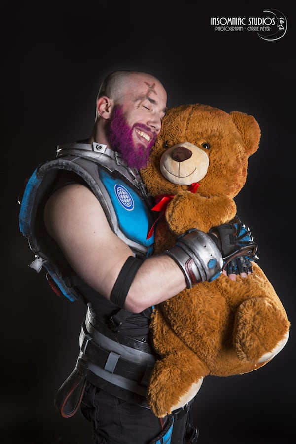 A Bald And Bearded Male Version of Zarya from Overwatch Cosplay