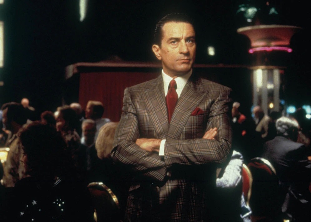 Robert De Niro in a brown plaid suit in Casino