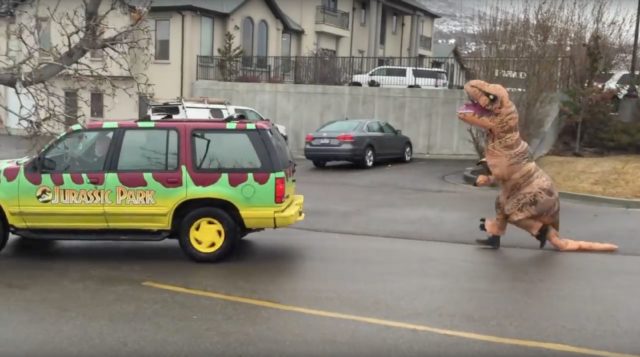 Live Shot On MSNBC Is Interrupted By Three Random Bystanders Wearing Inflatable T-Rex Costumes