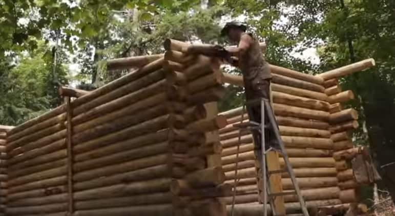 Timelapse of a Guy Single-Handedly Building a Log Cabin the Woods