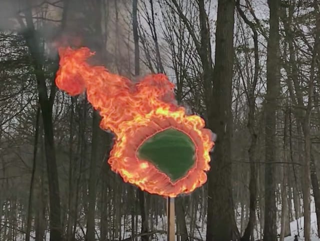 Guy Lights a Sphere Of 42,000 Wooden Matches