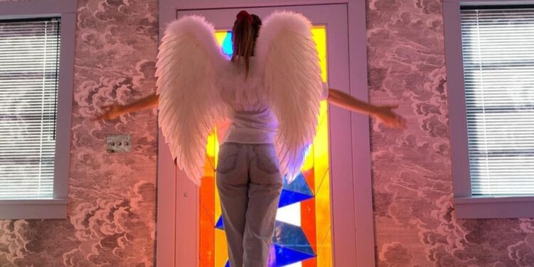 Paige Elkington on angel wings