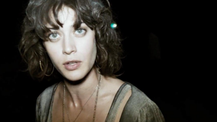 Lizzy Caplan Looking Into Camera in Cloverfield