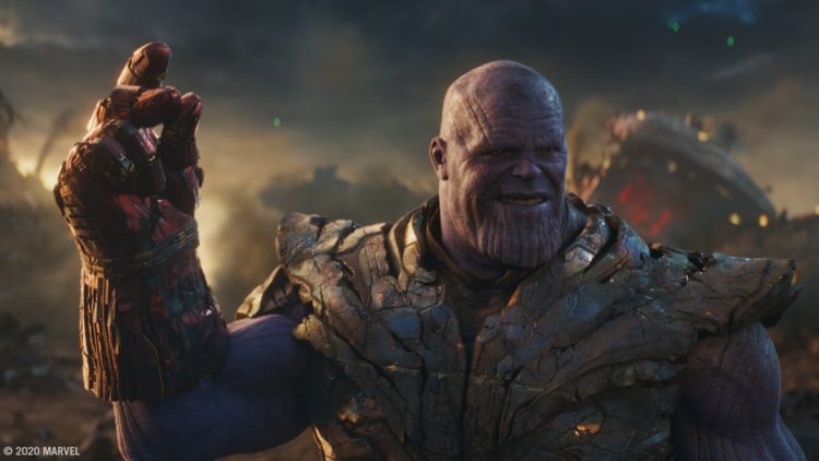 Thanos snapping his fingers to end half of all life with the Infinity Stones