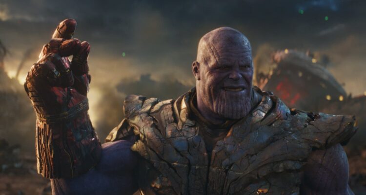 Thanos snapping his fingers to end half of all life with the Infinity Stones
