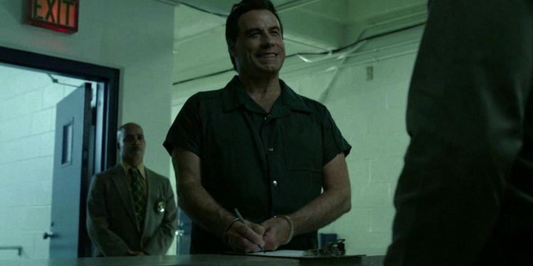 John Travolta Smiling Handcuffs