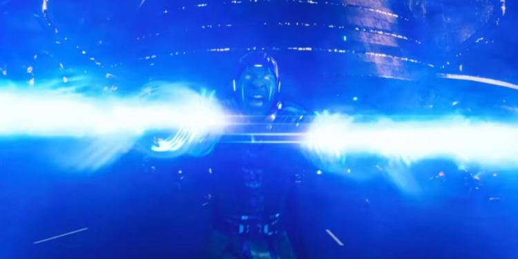 Kang firing energy blasts from his neuro-kinetic armor