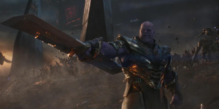 Thanos standing in front of his army brandishing a sword