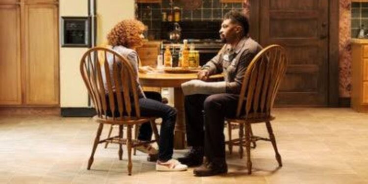 Deon Cole and his on-screen wife in Average Joe