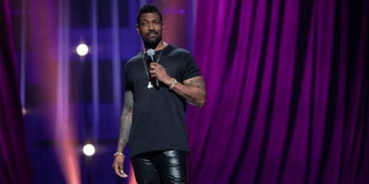 Deon Cole as a stand-up comedian