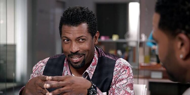 Deon Cole smiling