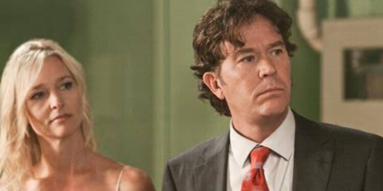 Kari Matchett and Timothy Hutton in Leverage