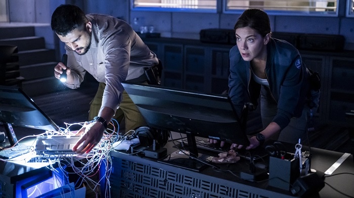 Phoenix Raei as Uri Wasserman and Michelle Monaghan as Abby Trent in Black Site