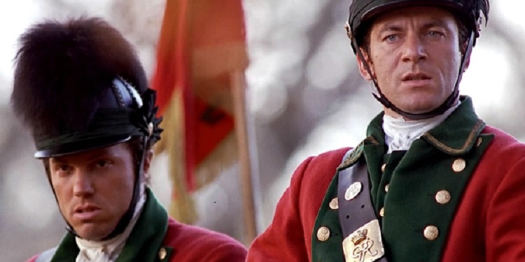 Adam Baldwin in the role of Captain Wilkins alongside Colonel William Tavington (Jason Isaacs)