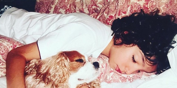 Adriana de Moura's Son Alex sleeping and her dog