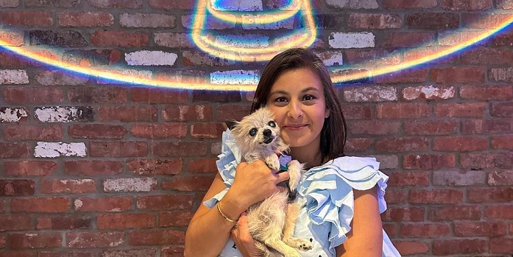 Bessy Gatto at an Event With a Dog