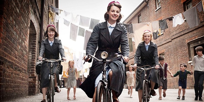 The cast of Call The Midwife cycling in a street - TV Shows Like The Queen's Gambit