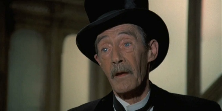 John Carradine in a suit in The Shootist