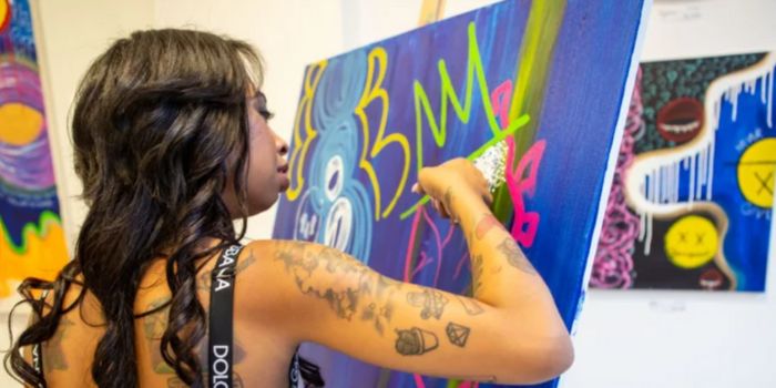 Amarah Dean as a painter