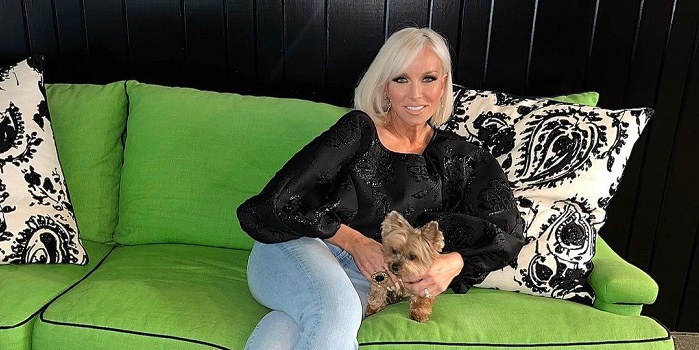 Margaret Josephs lounging with her dog