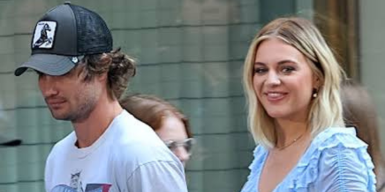 Chase Stokes and Kelsea Ballerini walking