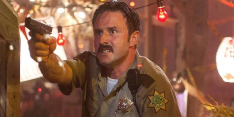 David Arquette as Sheriff Dewey Riley in Scream 4