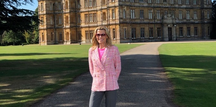 Vanna Standing in front of High Clere Castle