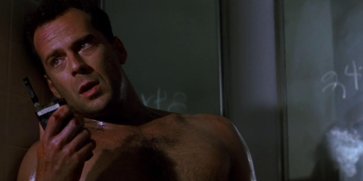 Bruce Willis as John McClane in Die Hard (1988)