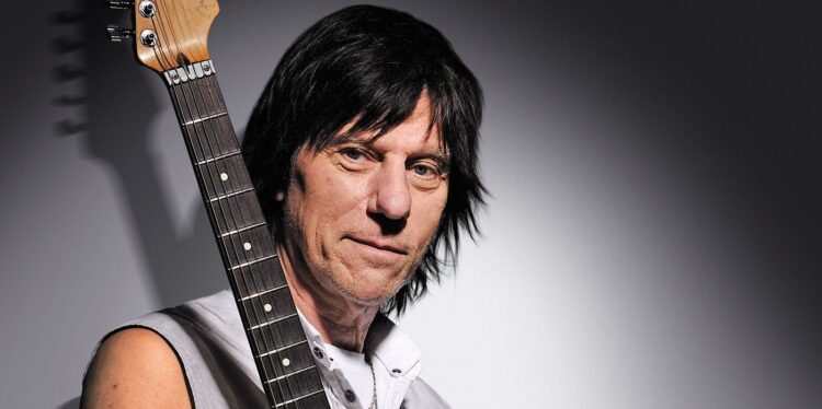 Jeff Beck posing with a guitar - Musicians who died in 2023