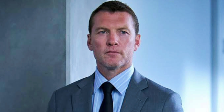 Sam Worthington as Huxley in Lift (2024)