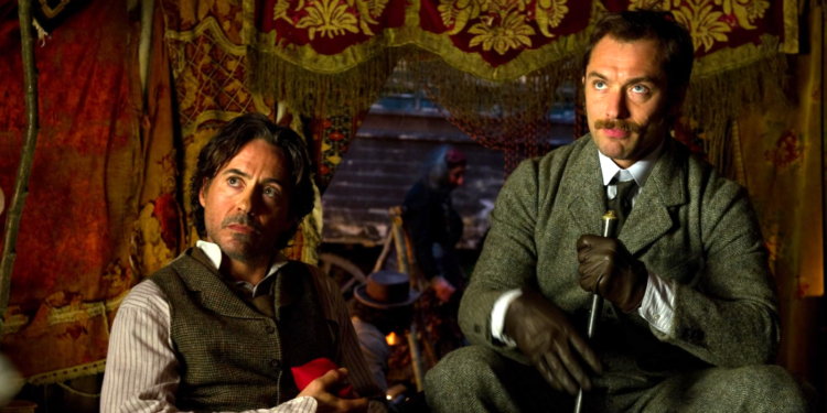 Jude Law and Robert Downey Jr. in Sherlock Holmes: A Game of Shadows (2011)