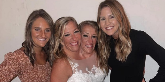 Abby and Brittany Hensel with friends on their supposed wedding day