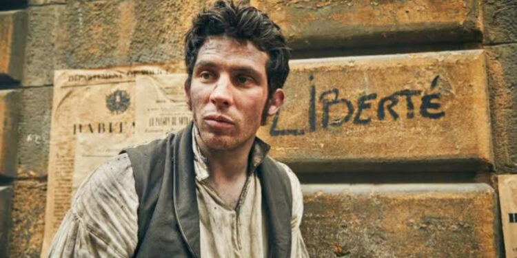 Josh O'Connor as Marius in Les Misérables