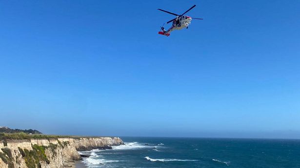 Kite Surfer Rescued in California After Spelling HELP with Rocks