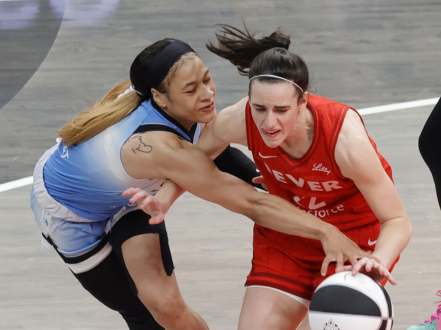 Caitlin Clark Leads Indiana Fever to Victory Over Sky Amid Physical Rivalry