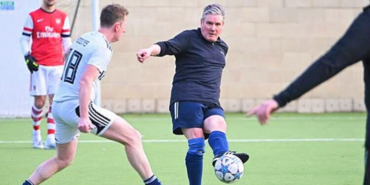 Keir Starmer playing football