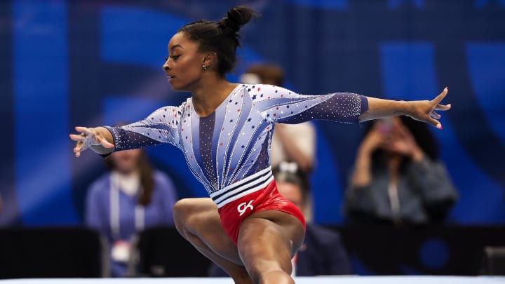 Biles consoling Lee after gymnastics routine