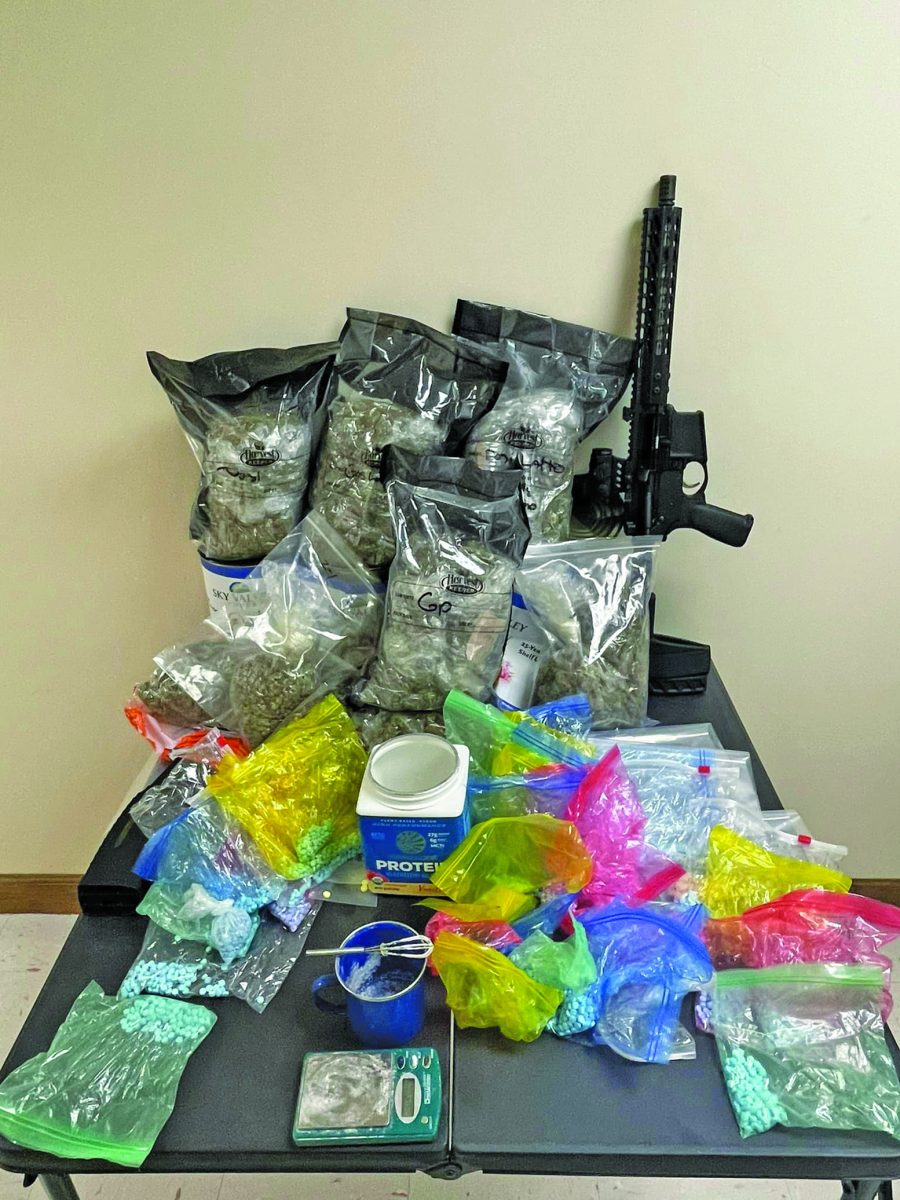 Four Arrested with Stolen Guns and Drugs After Seminole Traffic Stop