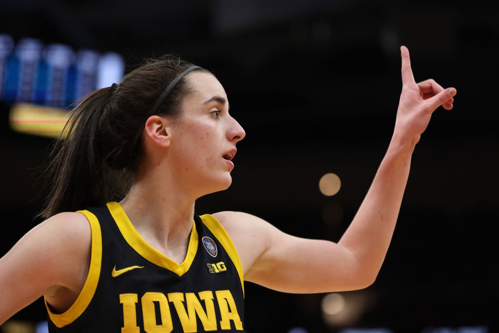 Caitlin Clark in Indiana Fever uniform during game Harrison Barnes Applauds Caitlin Clark’s Record-Breaking NCAA Achievements