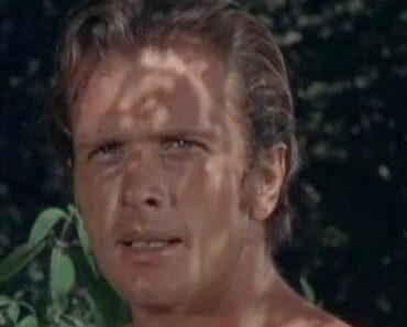 Ron Ely as Tarzan