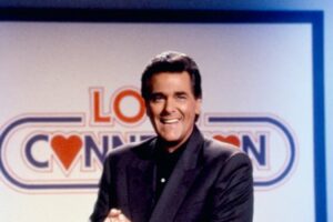 Chuck Woolery smiles for a picture