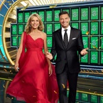 Wheel of Fortune hosts Ryan Seacrest and Vanna White