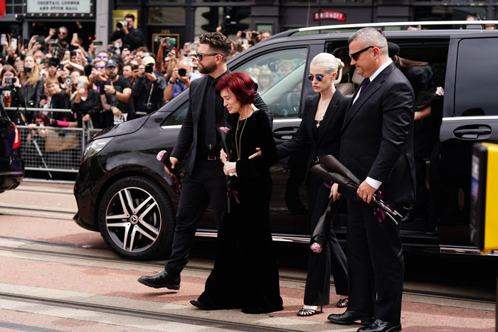 “She’s A Broken Woman”: Tearful Sharon Osbourne Joins Kids In Heartbreaking Farewell At Ozzy’s Funeral