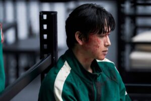 Yim Si-wan as Lee Myung-gi in Squid Game