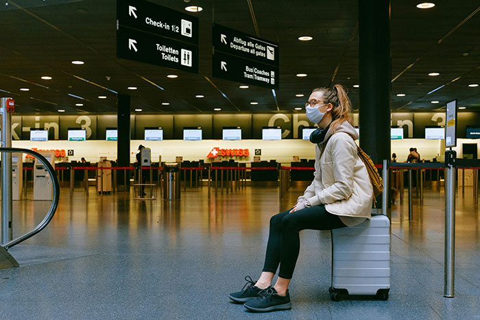 Woman Tries To Survive TSA At 7AM, Gets Ambushed By Rude Mom With Opinions And A Megaphone Kid